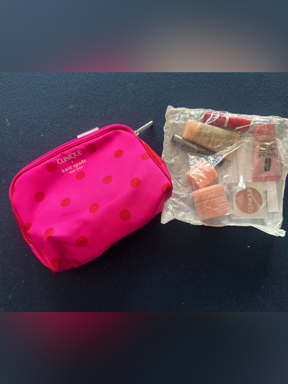 Kate Spade X Clinque collab! Pink Polka Dot Cosmetic zippered pouch w/ minis💕